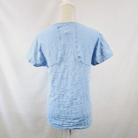 Athleta Allover Graphic Seamless Running Tee size Large - Picture 6 of 8